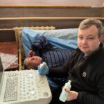 people working in a mobile clinic