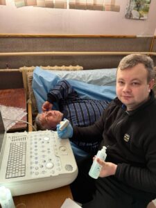 a dr performing an ultrasound
